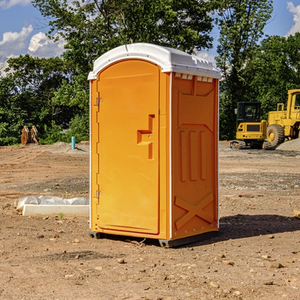 how often are the portable restrooms cleaned and serviced during a rental period in Mikes